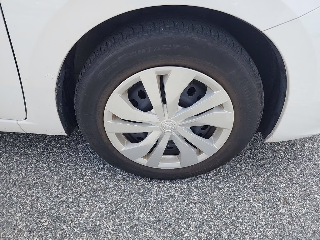 2024 Aspen White Tricoat Nissan Versa 1.6 S FWD Sedan