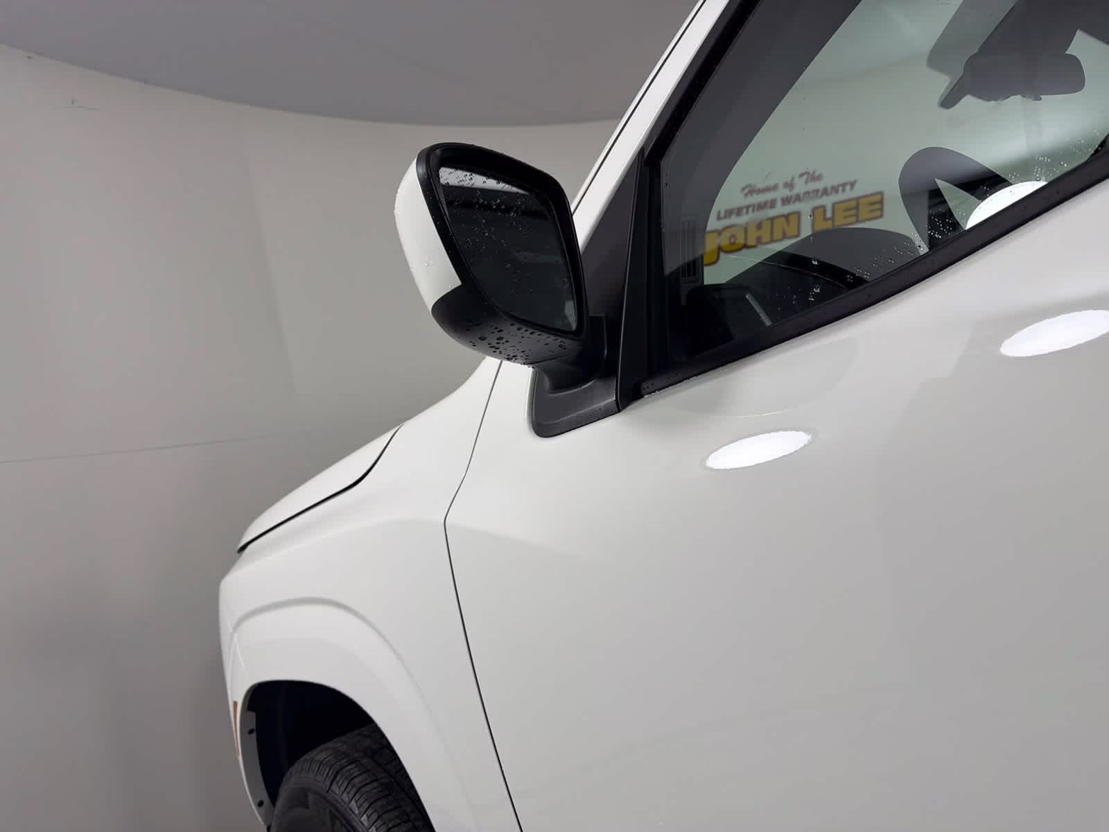 2026 Glacier White Nissan Frontier SV 4X4 Truck