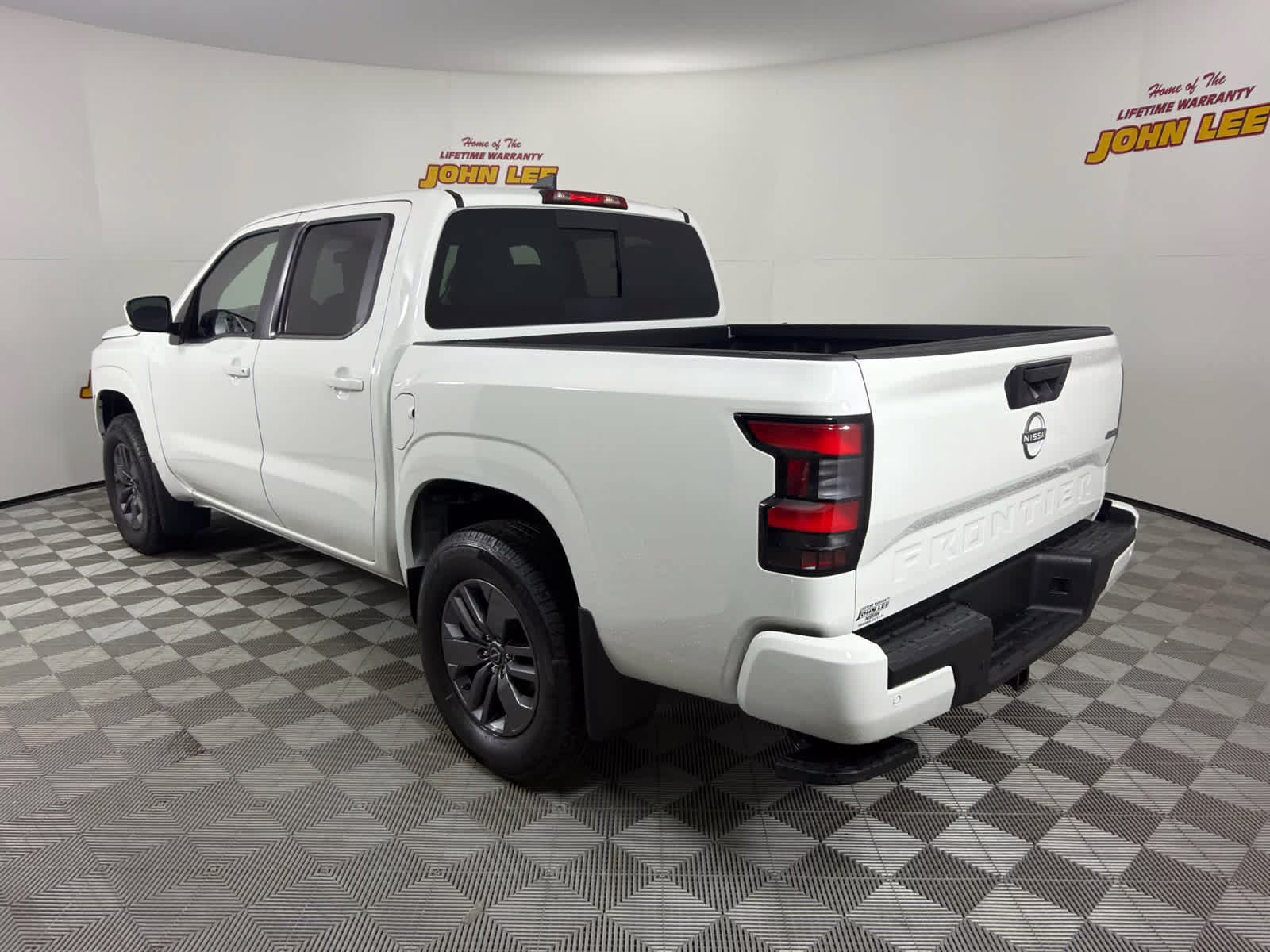 2026 Glacier White Nissan Frontier SV 4X4 Truck