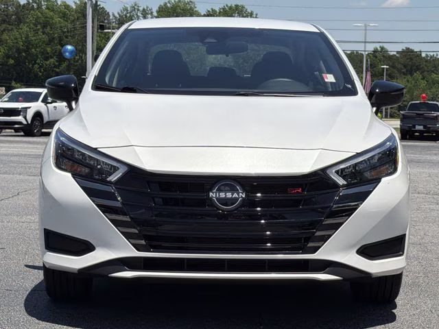 2025 Aspen White Tricoat Nissan Versa 1.6 SR FWD Sedan