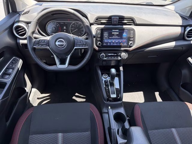 2025 Aspen White Tricoat Nissan Versa 1.6 SR FWD Sedan