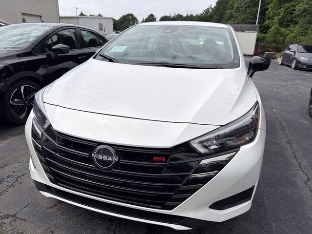 2025 Aspen White Tricoat Nissan Versa 1.6 SR FWD Sedan