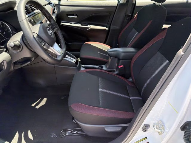 2025 Aspen White Tricoat Nissan Versa 1.6 SR FWD Sedan