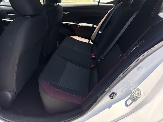 2025 Aspen White Tricoat Nissan Versa 1.6 SR FWD Sedan