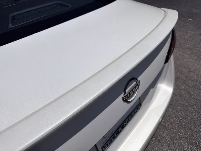 2025 Aspen White Tricoat Nissan Versa 1.6 SR FWD Sedan