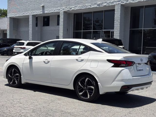 2025 Aspen White Tricoat Nissan Versa 1.6 SR FWD Sedan