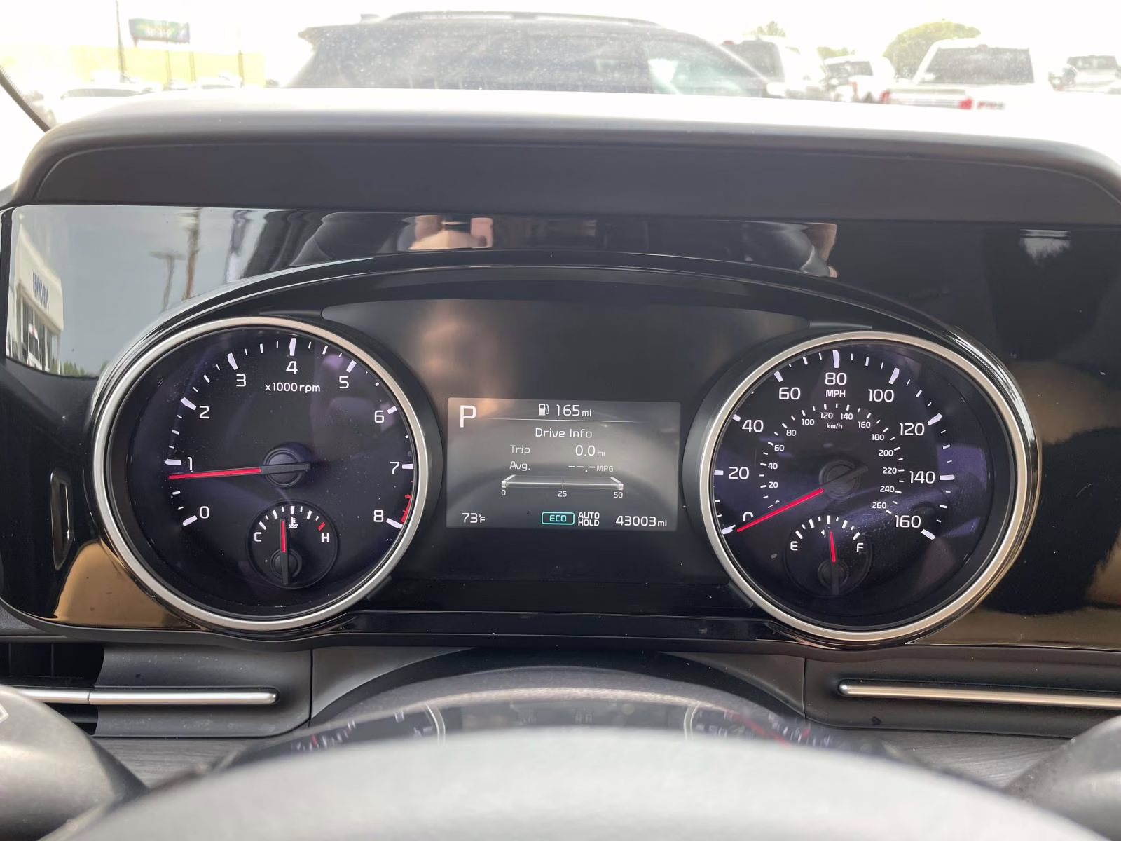 2024 Ceramic Silver Kia Carnival EX FWD Van