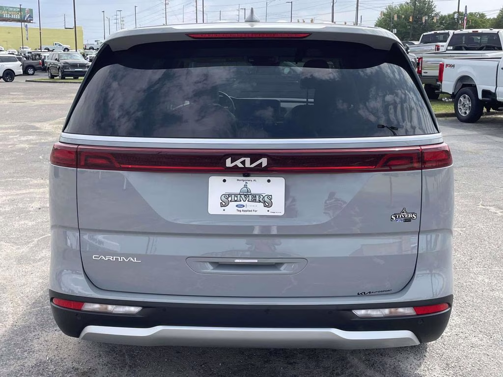 2024 Ceramic Silver Kia Carnival EX FWD Van