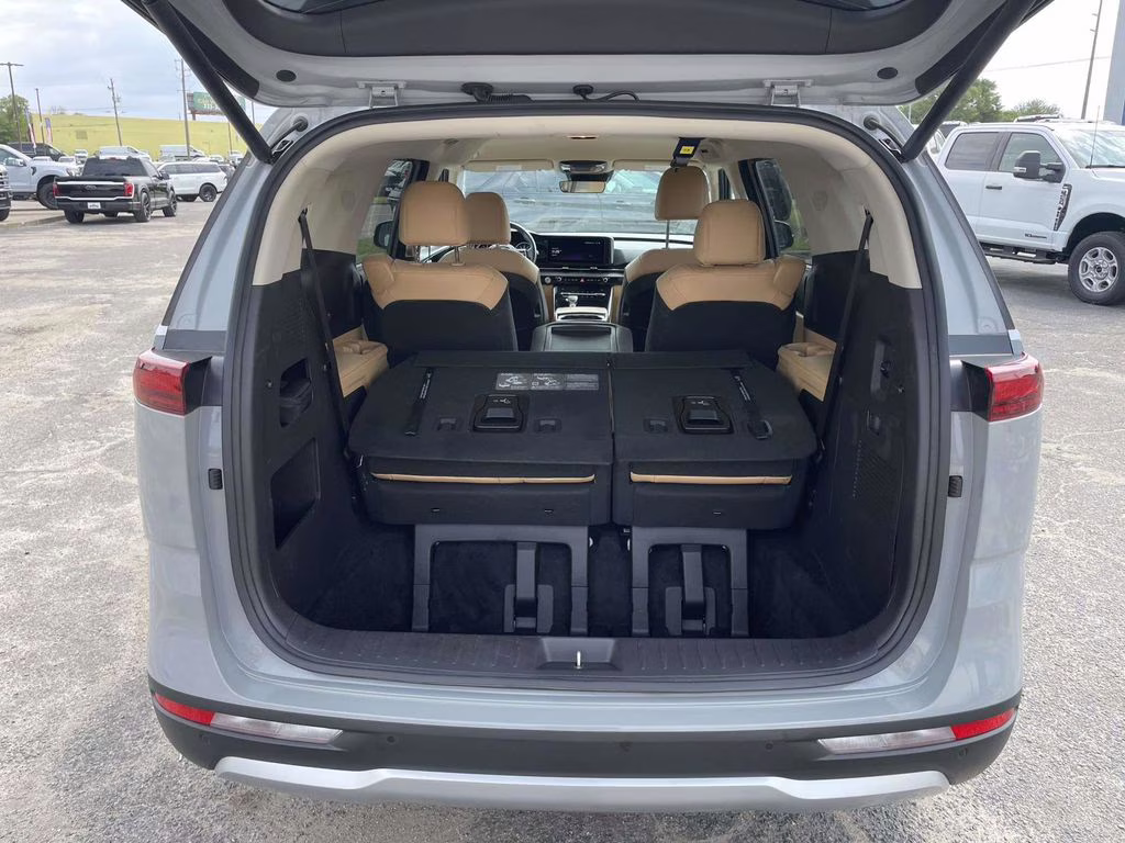 2024 Ceramic Silver Kia Carnival EX FWD Van