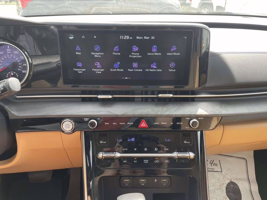 2024 Ceramic Silver Kia Carnival EX FWD Van