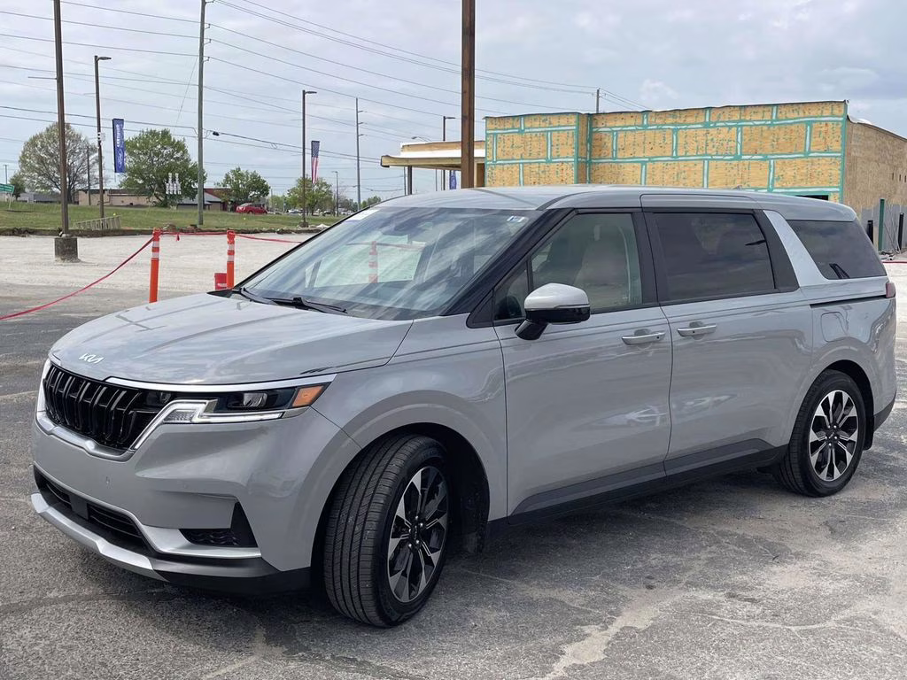 2024 Ceramic Silver Kia Carnival EX FWD Van