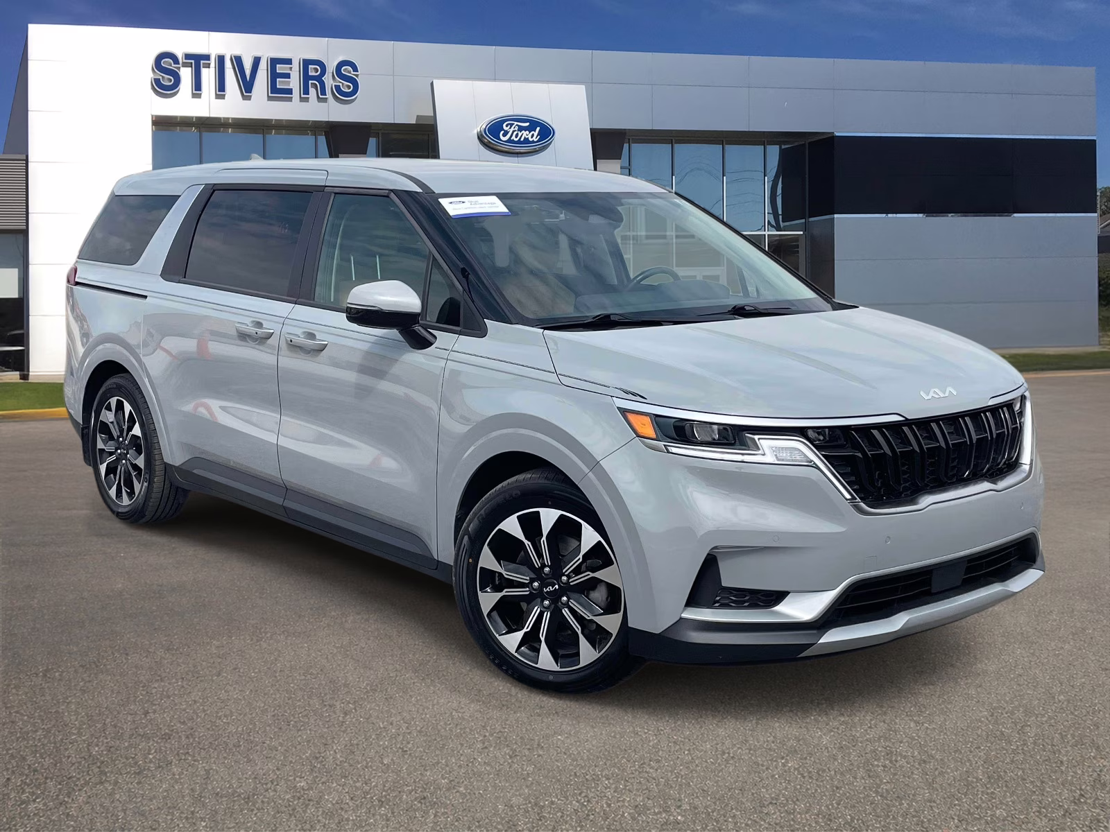 2024 Ceramic Silver Kia Carnival EX FWD Van