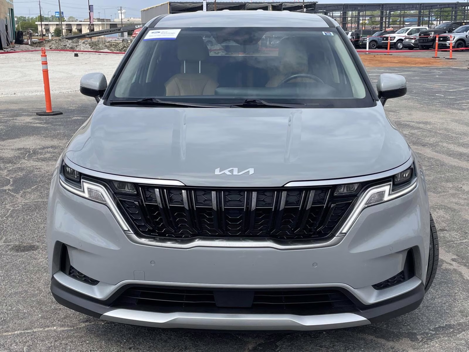 2024 Ceramic Silver Kia Carnival EX FWD Van