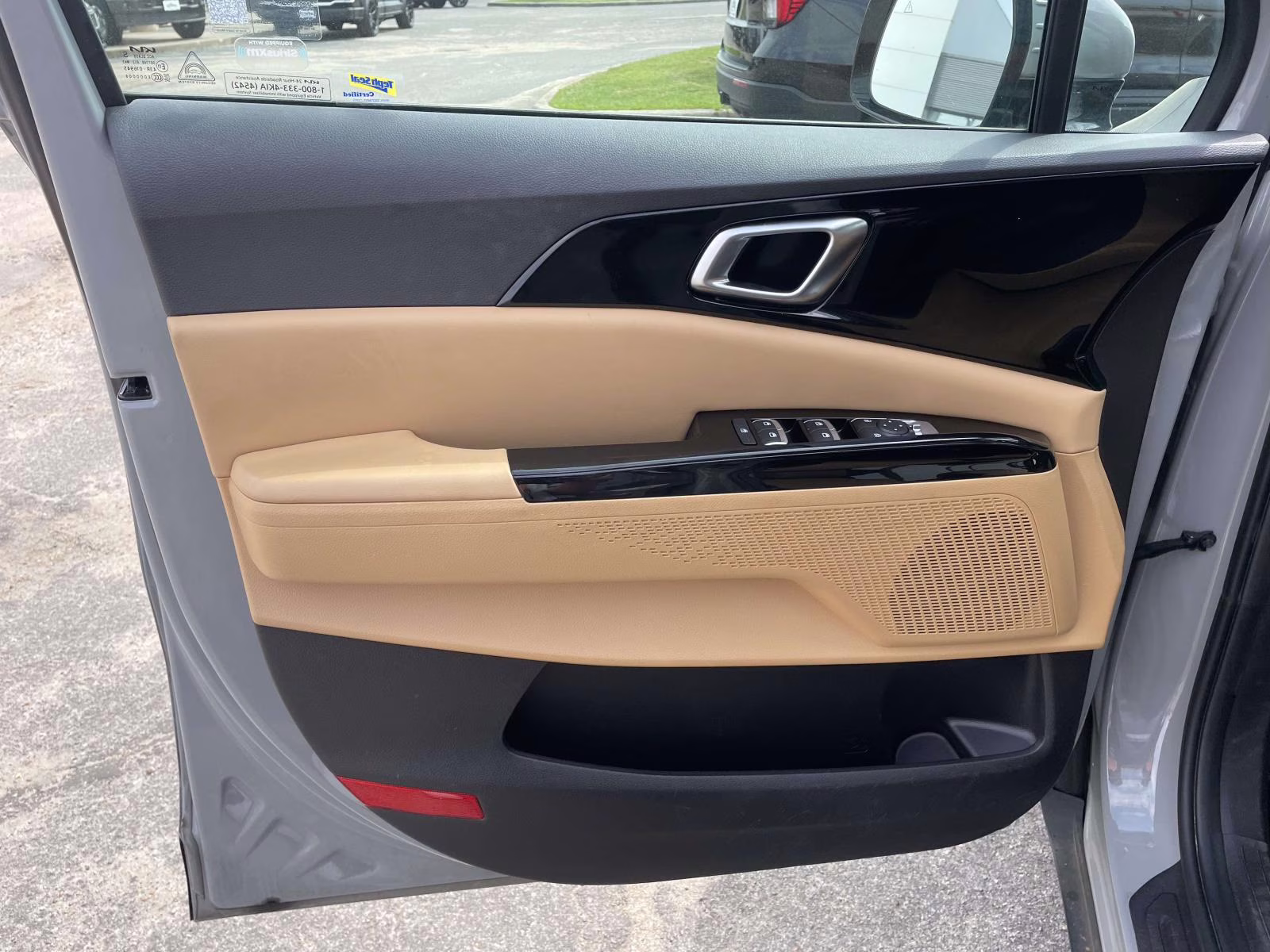 2024 Ceramic Silver Kia Carnival EX FWD Van