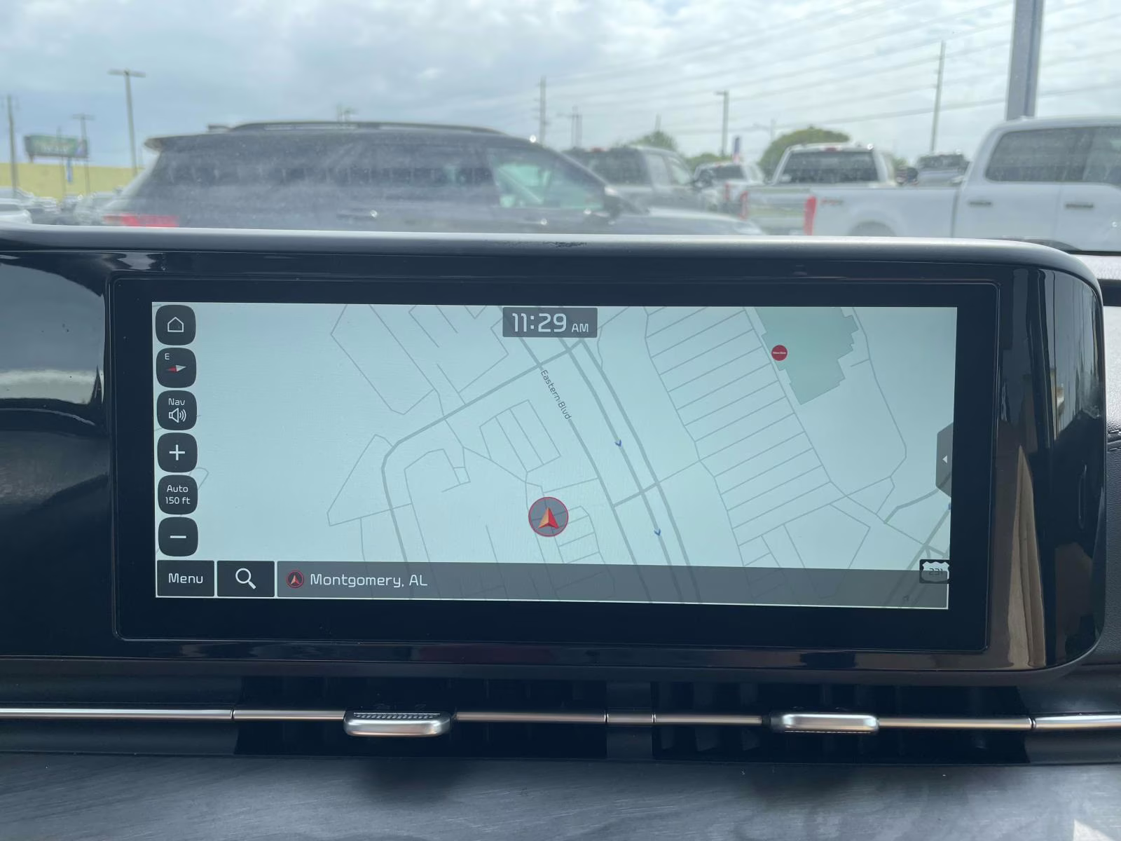 2024 Ceramic Silver Kia Carnival EX FWD Van