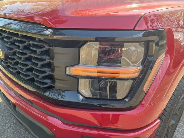 2025 Rapid Red Metallic Tinted Clearcoat Ford F-150 STX 4X4 Truck