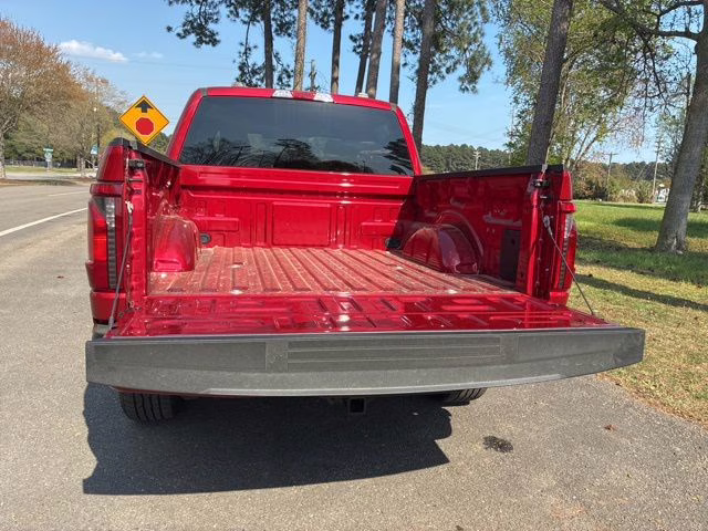 2025 Rapid Red Metallic Tinted Clearcoat Ford F-150 STX 4X4 Truck