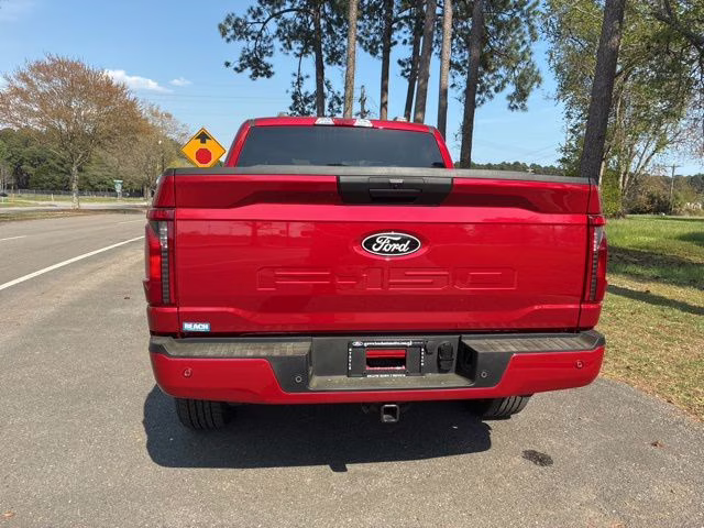 2025 Rapid Red Metallic Tinted Clearcoat Ford F-150 STX 4X4 Truck