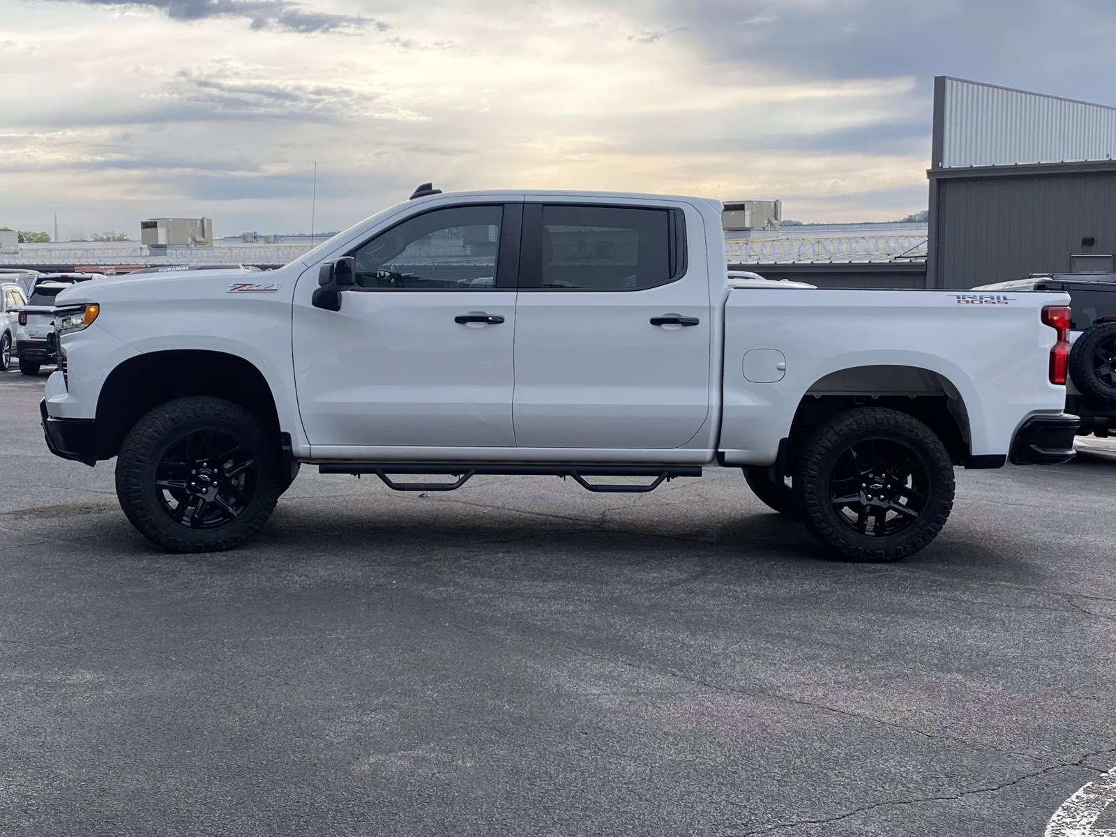 2023 Summit White Chevrolet Silverado 1500 LT Trail Boss 4X4 Truck