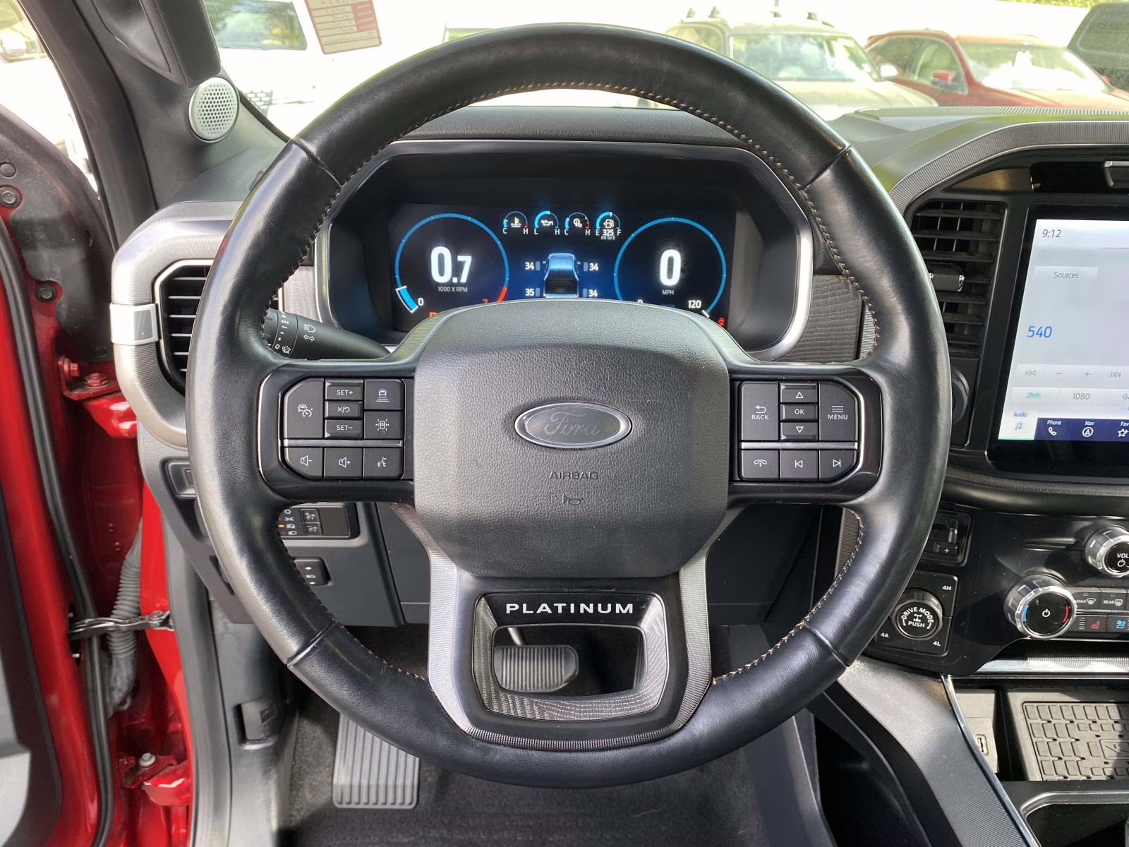 2023 Rapid Red Metallic Tinted Clearcoat Ford F-150 Platinum 4X4 Truck