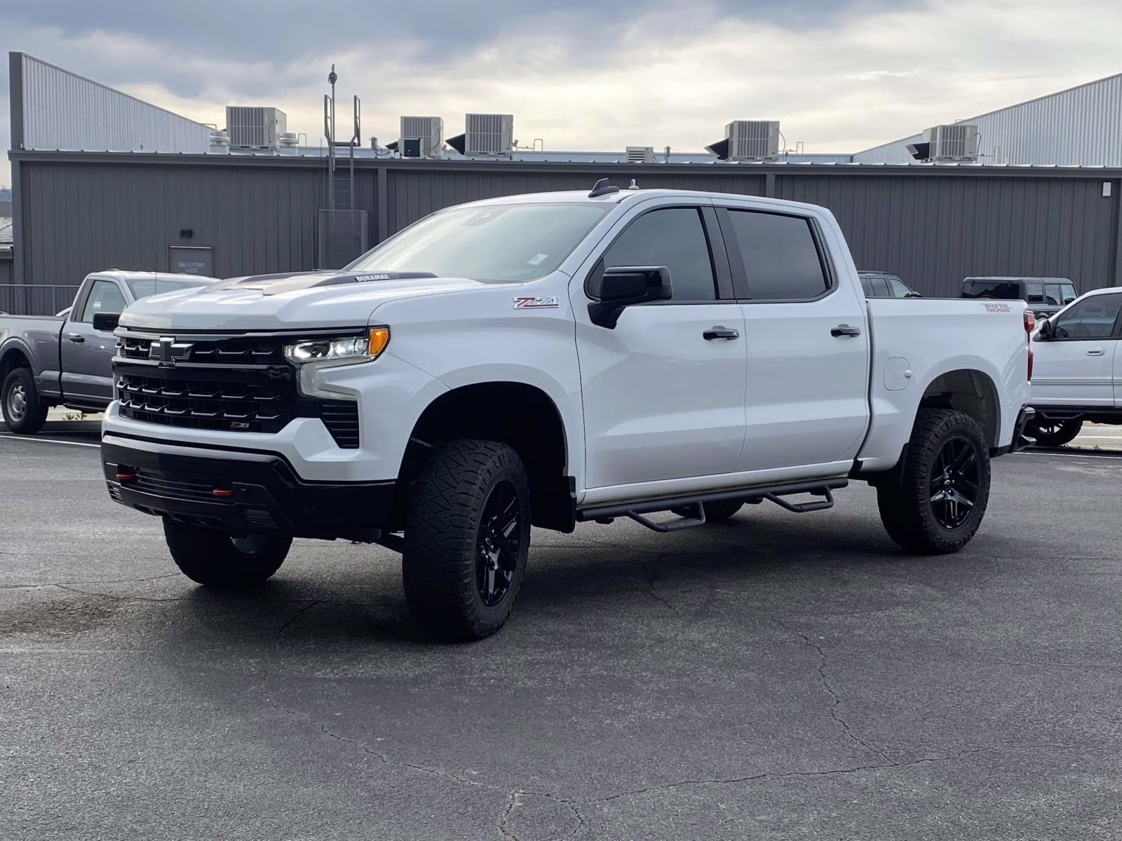 2023 Summit White Chevrolet Silverado 1500 LT Trail Boss 4X4 Truck
