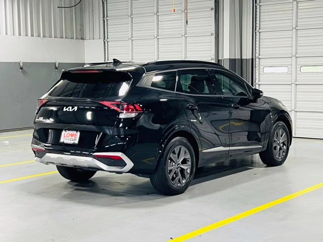 2024 Ebony Black Kia Sportage SX FWD SUV