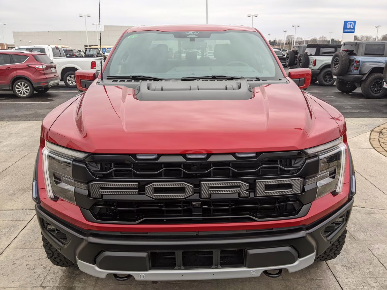 2025 Rapid Red Metallic Tinted Clearcoat Ford F-150 Raptor 4X4 Truck