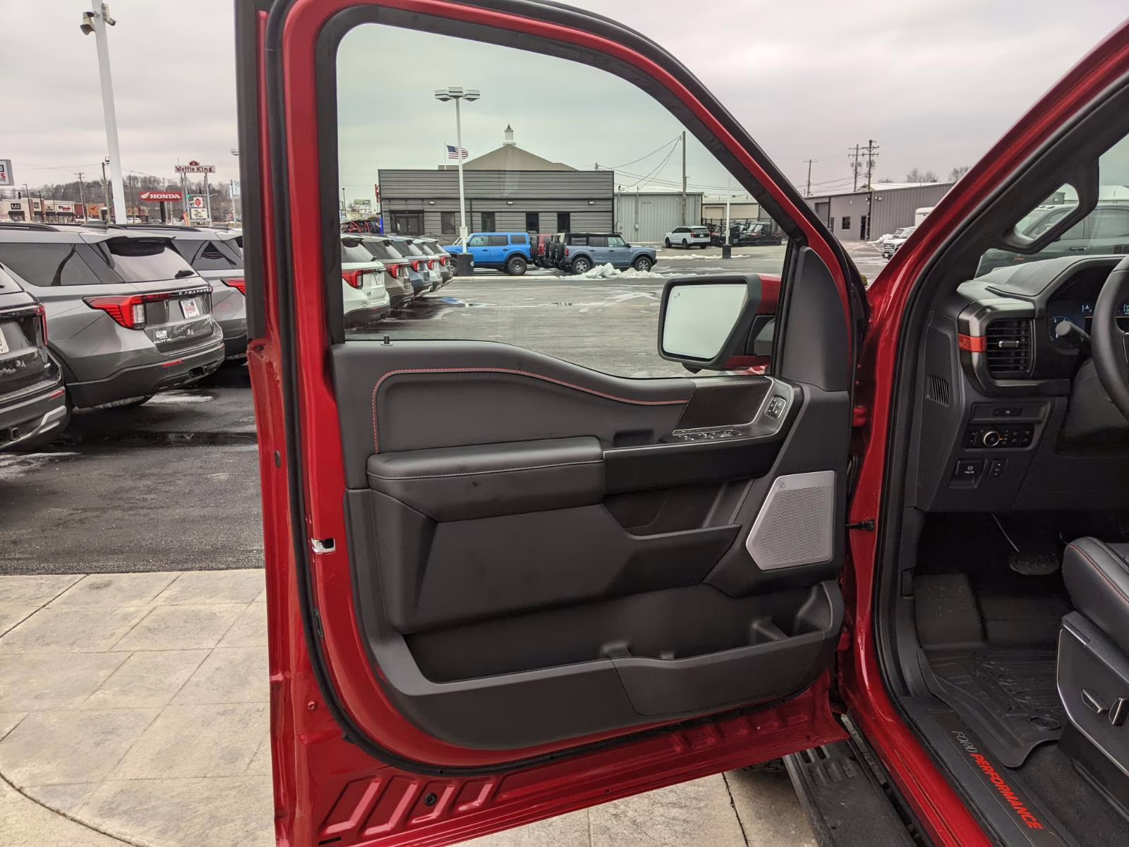 2025 Rapid Red Metallic Tinted Clearcoat Ford F-150 Raptor 4X4 Truck