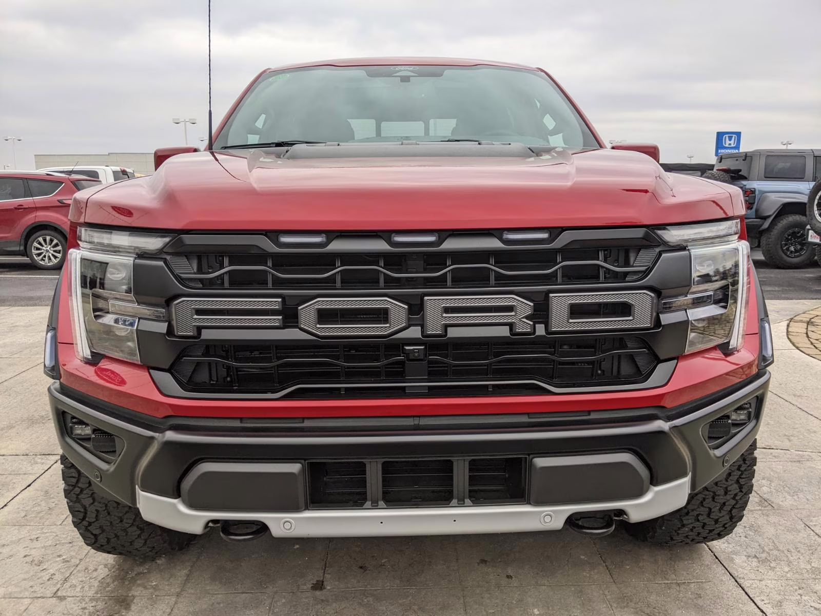 2025 Rapid Red Metallic Tinted Clearcoat Ford F-150 Raptor 4X4 Truck