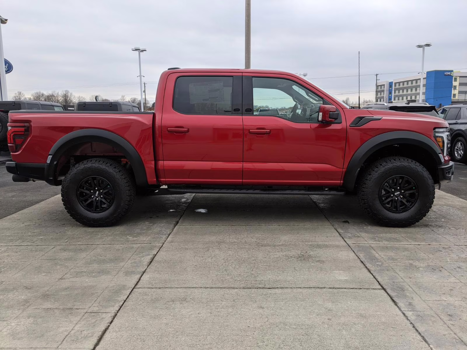 2025 Rapid Red Metallic Tinted Clearcoat Ford F-150 Raptor 4X4 Truck
