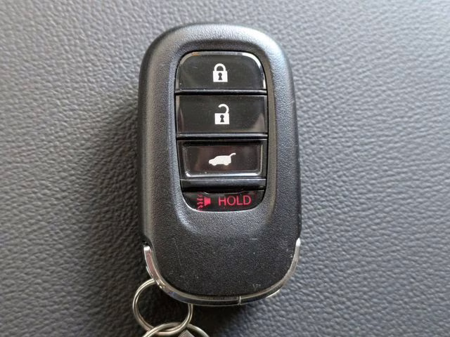 2025 Radiant Red Metallic Honda CR-V LX AWD SUV