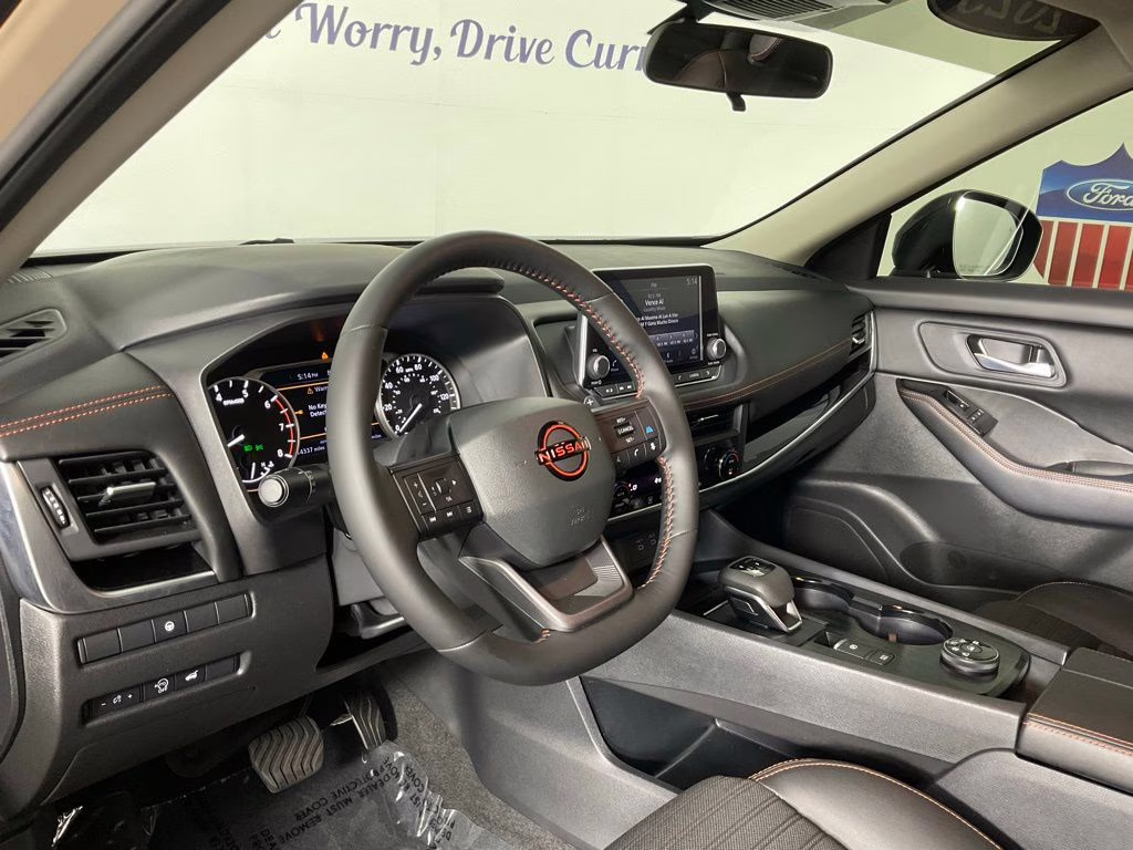 2025 Baja Storm Metallic Nissan Rogue Rock Creek AWD SUV