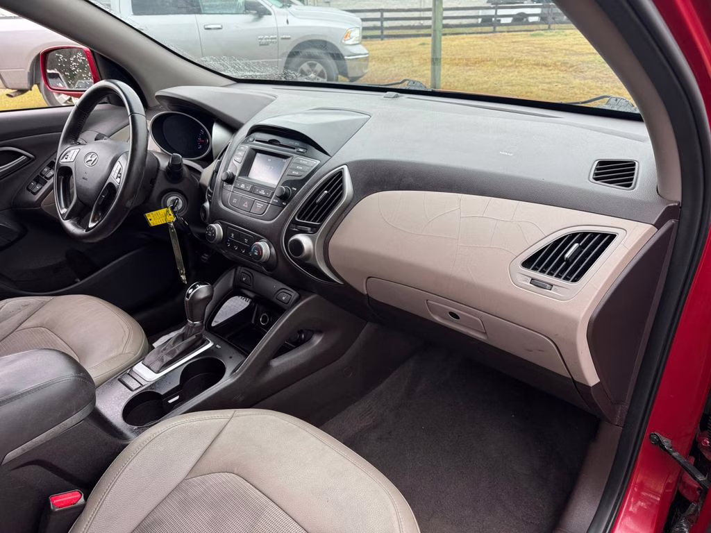 2014 Garnet Red Hyundai Tucson SE FWD SUV