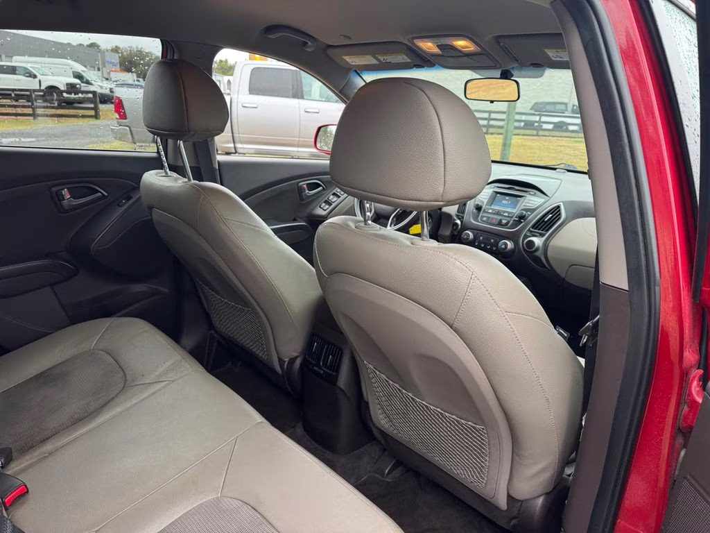 2014 Garnet Red Hyundai Tucson SE FWD SUV