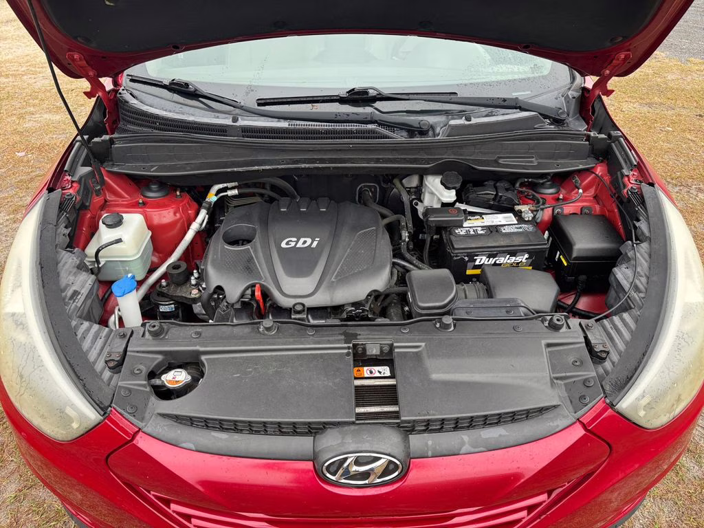 2014 Garnet Red Hyundai Tucson SE FWD SUV