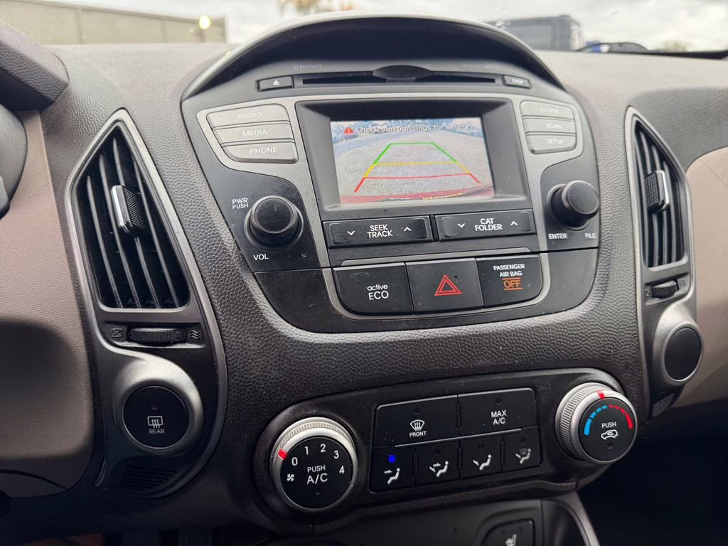 2014 Garnet Red Hyundai Tucson SE FWD SUV