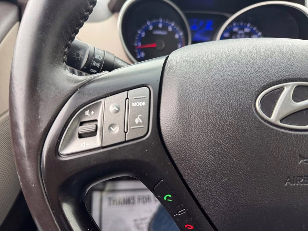 2014 Garnet Red Hyundai Tucson SE FWD SUV