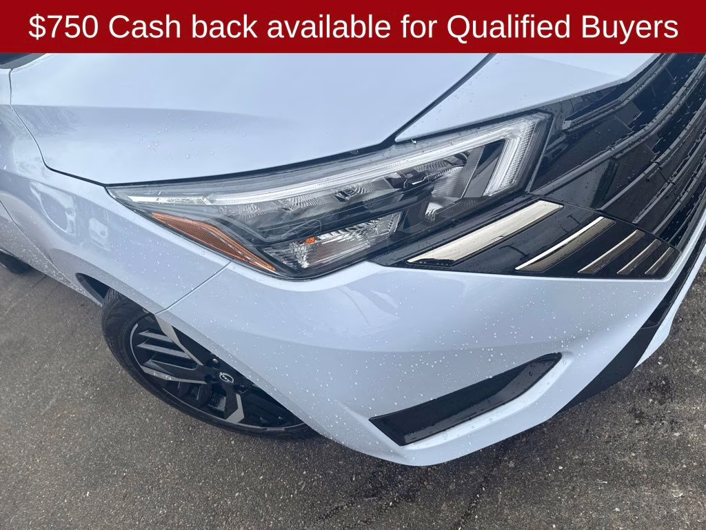 2025 Gray Sky Pearl Nissan Versa 1.6 SR FWD Sedan