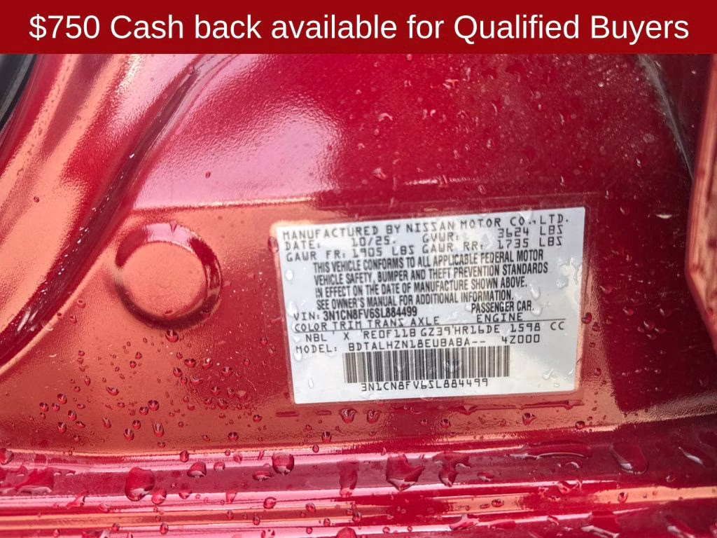 2025 Scarlet Ember Tintcoat Nissan Versa 1.6 SR FWD Sedan