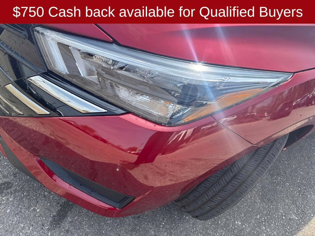 2025 Scarlet Ember Tintcoat Nissan Versa 1.6 SR FWD Sedan