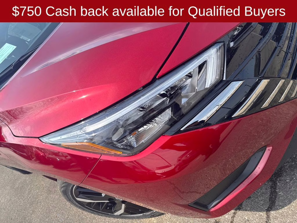 2025 Scarlet Ember Tintcoat Nissan Versa 1.6 SR FWD Sedan