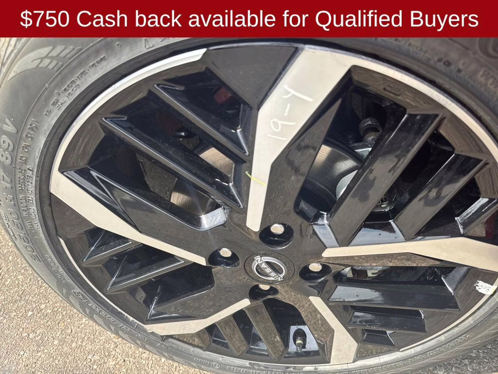 2025 Scarlet Ember Tintcoat Nissan Versa 1.6 SR FWD Sedan