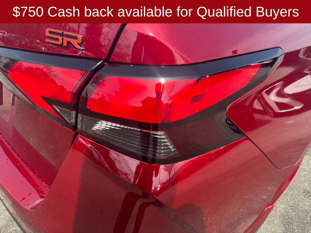 2025 Scarlet Ember Tintcoat Nissan Versa 1.6 SR FWD Sedan