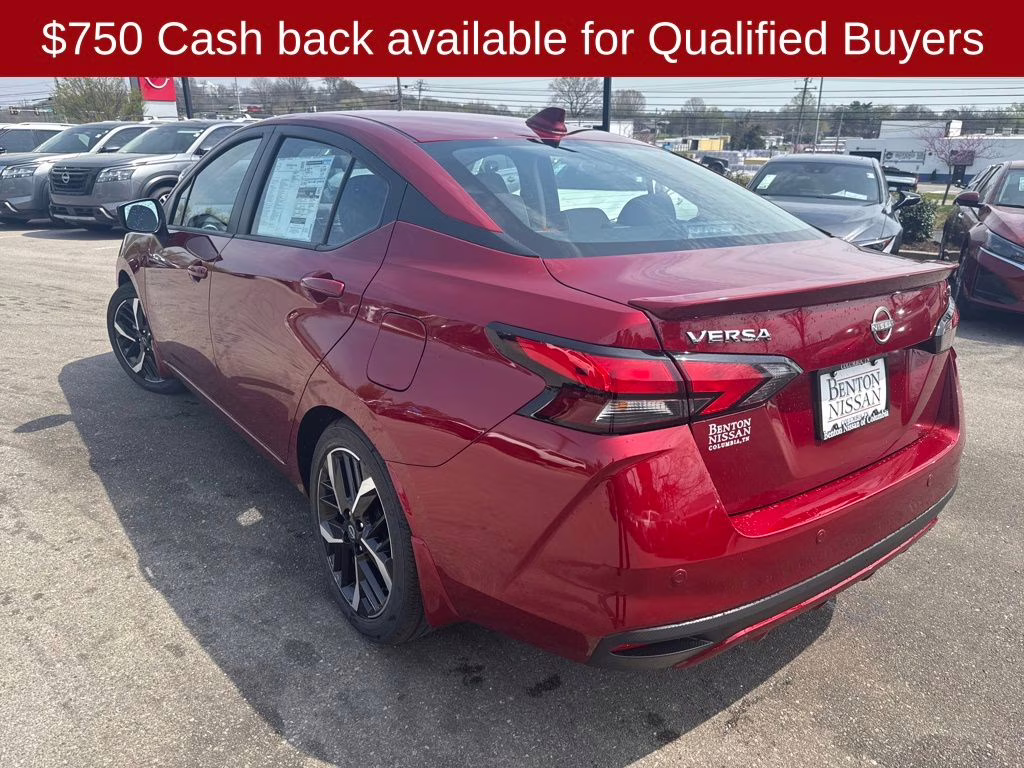 2025 Scarlet Ember Tintcoat Nissan Versa 1.6 SR FWD Sedan