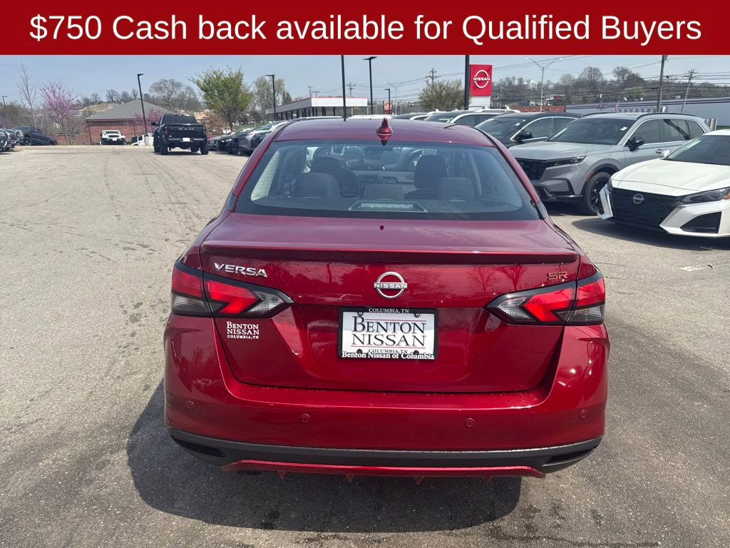 2025 Scarlet Ember Tintcoat Nissan Versa 1.6 SR FWD Sedan