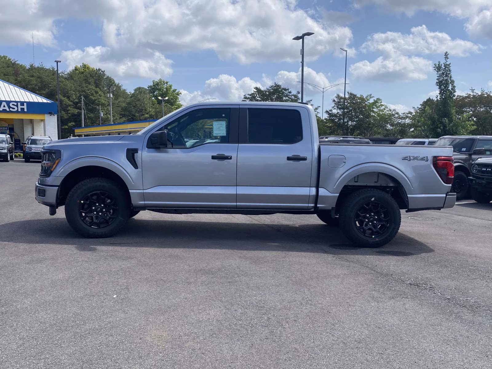 2026 Iconic Silver Metallic Ford F-150 STX 4X4 Truck