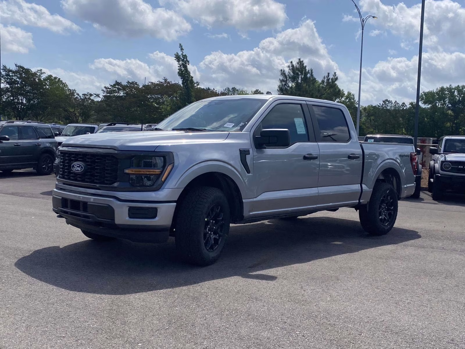 2026 Iconic Silver Metallic Ford F-150 STX 4X4 Truck
