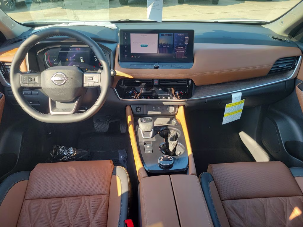 2026 Everest White Pearl/Super Black Nissan Rogue Platinum AWD SUV