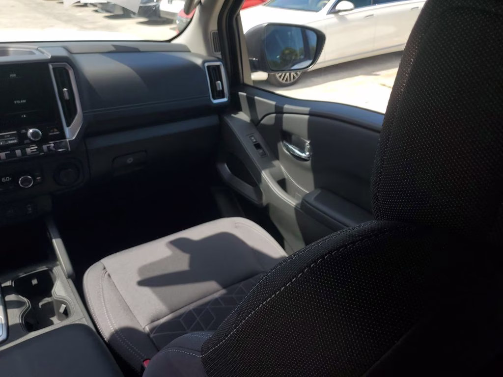 2026 Glacier White Nissan Frontier SV 4X4 Truck