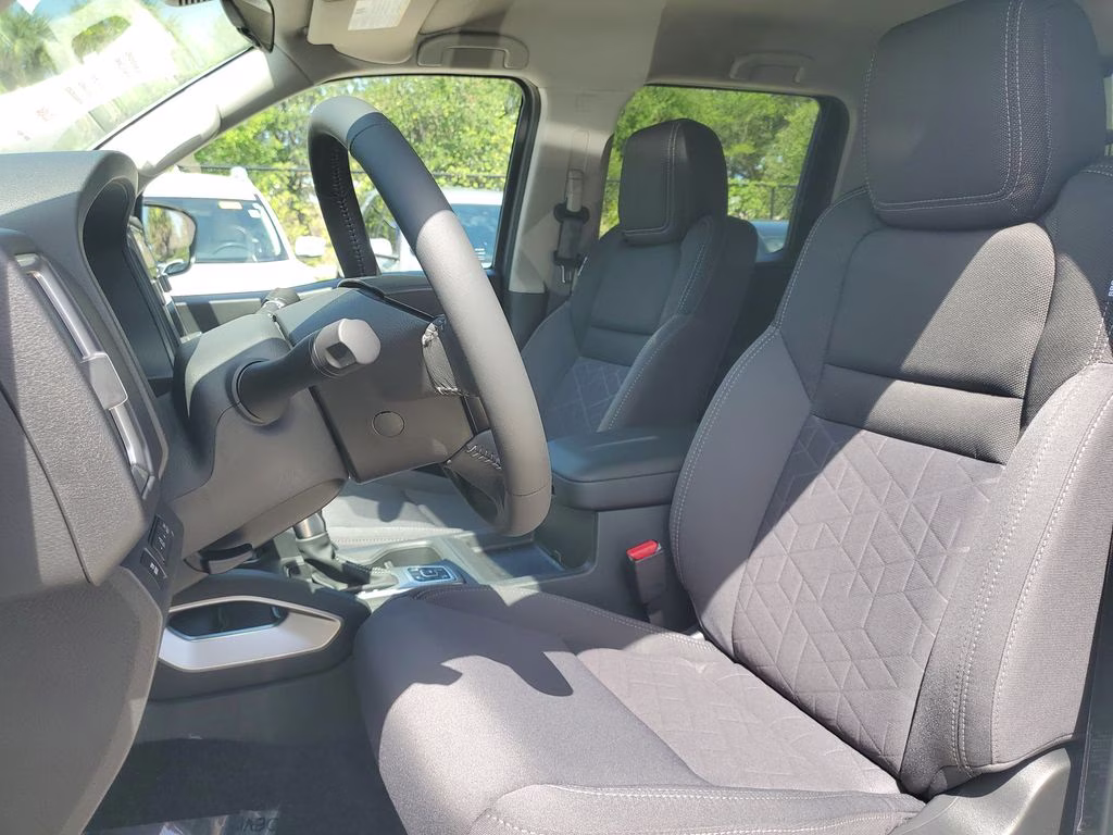 2026 Glacier White Nissan Frontier SV 4X4 Truck